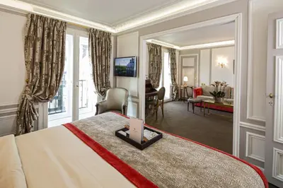 Un ou plusieurs lits dans un hébergement de l'établissement Hôtel Regina Louvre