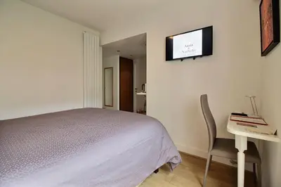 Télévision ou salle de divertissement dans l'établissement Assia & Nathalie - Luxury B&B MARAIS