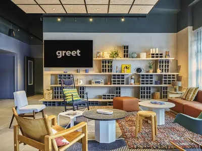 Coin salon dans l'établissement Greet Hotel Paris porte de la Chapelle - Aréna