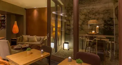 Coin salon dans l'établissement Hidden Hotel