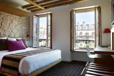 Un ou plusieurs lits dans un hébergement de l'établissement Select Hotel