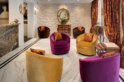 Coin salon dans l'établissement Hôtel Kleber Paris & Spa