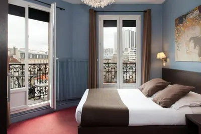 Un ou plusieurs lits dans un hébergement de l'établissement Hôtel Odessa Montparnasse