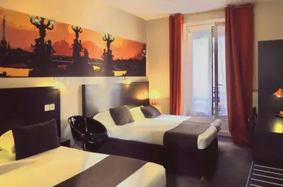 Un ou plusieurs lits dans un hébergement de l'établissement Hôtel Odessa Montparnasse