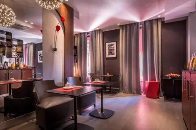 Coin salon dans l'établissement Hôtel Garance