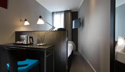 Cuisine ou kitchenette dans l'établissement Hôtel Garance