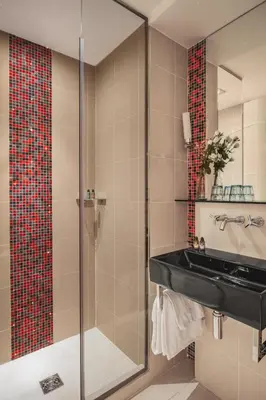 Salle de bains dans l'établissement Hotel Le petit Paris
