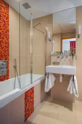 Salle de bains dans l'établissement Hotel Le petit Paris