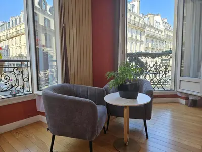 Coin salon dans l'établissement Home Latin