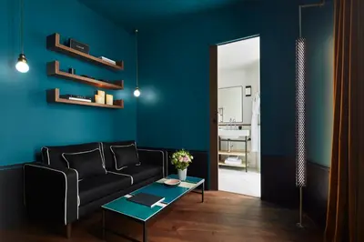 Coin salon dans l'établissement Le Roch Hotel & Spa