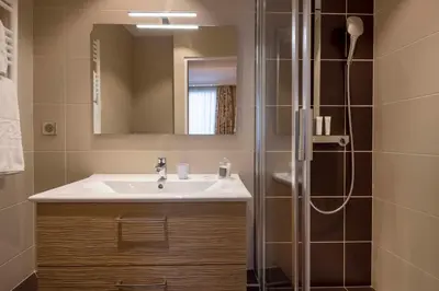 Salle de bains dans l'établissement Hôtel Le Regent Paris