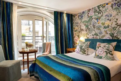 Un ou plusieurs lits dans un hébergement de l'établissement Hôtel Le Regent Paris