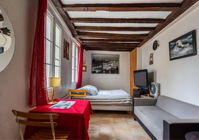 Un ou plusieurs lits dans un hébergement de l'établissement Appartement Mouffetard