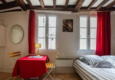 Un ou plusieurs lits dans un hébergement de l'établissement Appartement Mouffetard