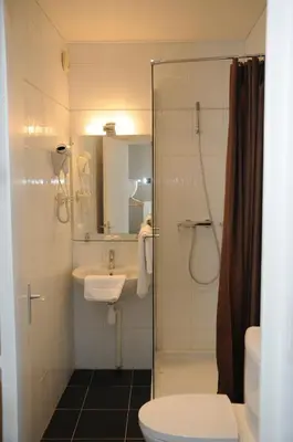 Salle de bains dans l'établissement Hôtel Patio Brancion