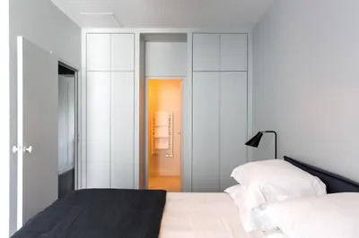 Un ou plusieurs lits dans un hébergement de l'établissement Habitat Parisien - Drouot Luxe