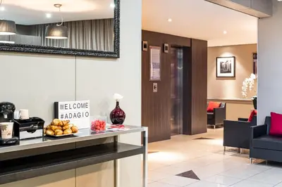 Coin salon dans l'établissement Aparthotel Adagio La Défense Esplanade