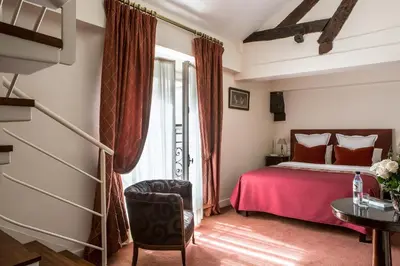 Un ou plusieurs lits dans un hébergement de l'établissement Hôtel des Saints Pères - Esprit de France