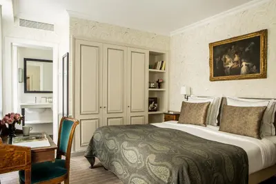 Un ou plusieurs lits dans un hébergement de l'établissement Hôtel des Saints Pères - Esprit de France