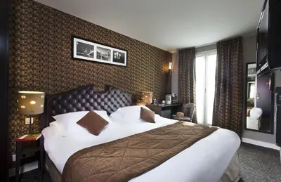 Un ou plusieurs lits dans un hébergement de l'établissement Hôtel du Prince Eugène