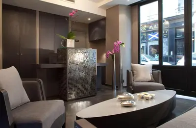 Coin salon dans l'établissement Hôtel Caron le Marais