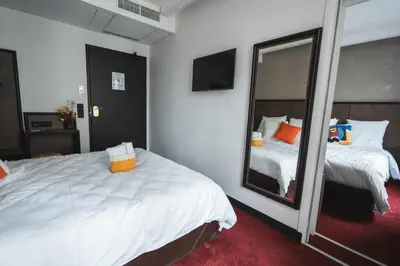 Un ou plusieurs lits dans un hébergement de l'établissement La Maison Montparnasse