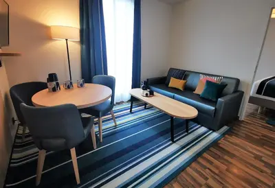 Coin salon dans l'établissement Residhome Asnieres