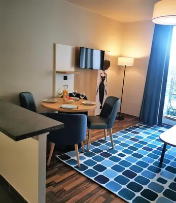 Coin salon dans l'établissement Residhome Asnieres
