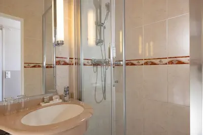 Salle de bains dans l'établissement Hotel Clément
