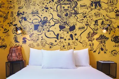 Un ou plusieurs lits dans un hébergement de l'établissement Ibis Styles Paris Gare de l'Est Magenta