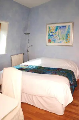Un ou plusieurs lits dans un hébergement de l'établissement 52 Clichy Bed & Breakfast - Chambre d'hôtes
