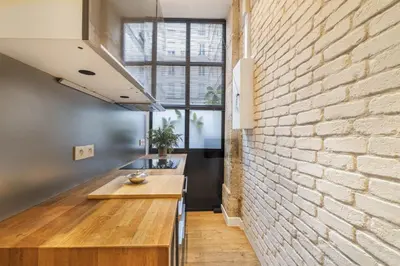 Cuisine ou kitchenette dans l'établissement Bulle