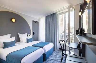 Un ou plusieurs lits dans un hébergement de l'établissement Hôtel de France Gare de Lyon Bastille