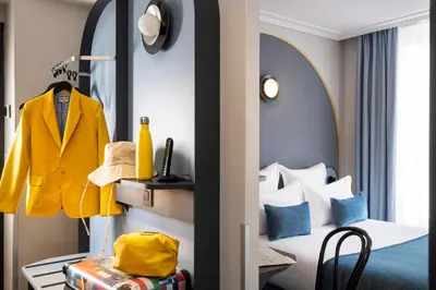 Un ou plusieurs lits dans un hébergement de l'établissement Hôtel de France Gare de Lyon Bastille