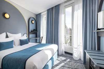 Un ou plusieurs lits dans un hébergement de l'établissement Hôtel de France Gare de Lyon Bastille