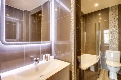 Salle de bains dans l'établissement Upper Class Suites - Rue Saint Honoré