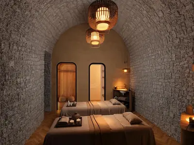 Un ou plusieurs lits dans un hébergement de l'établissement Grand Tonic hôtel & SPA Paris