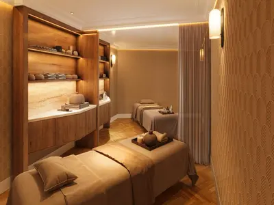 Un ou plusieurs lits dans un hébergement de l'établissement Grand Tonic hôtel & SPA Paris