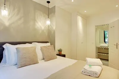 Un ou plusieurs lits dans un hébergement de l'établissement Pick A Flat's in Champs Elysees - Rue Percier