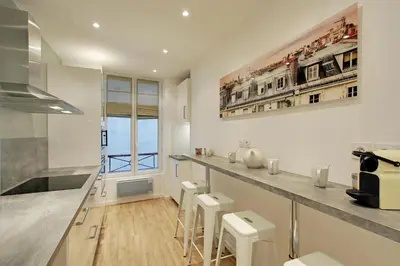 Cuisine ou kitchenette dans l'établissement Pick A Flat's in Champs Elysees - Rue Percier