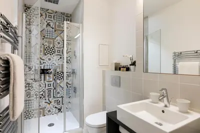 Salle de bains dans l'établissement Hôtel Square Louvois