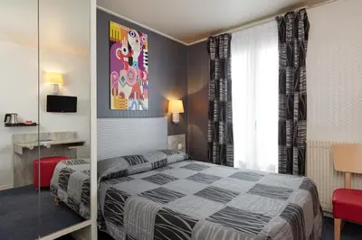 Un ou plusieurs lits dans un hébergement de l'établissement Hotel Miramar