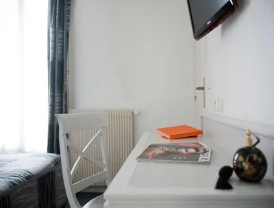 Un ou plusieurs lits dans un hébergement de l'établissement Hotel Miramar