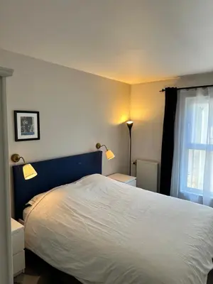 Un ou plusieurs lits dans un hébergement de l'établissement Appartement Lumineux Accor Arena Paris 13