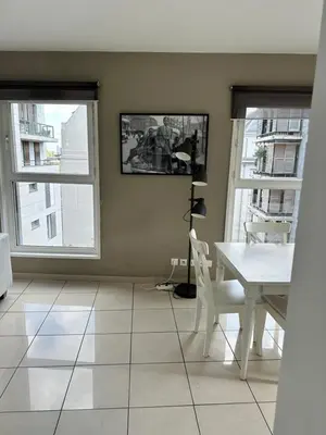 Télévision ou salle de divertissement dans l'établissement Appartement Lumineux Accor Arena Paris 13