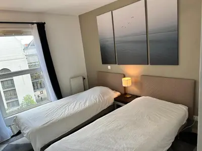 Un ou plusieurs lits dans un hébergement de l'établissement Appartement Lumineux Accor Arena Paris 13