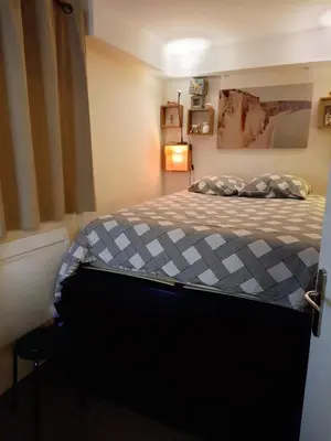 Un ou plusieurs lits dans un hébergement de l'établissement Cozy apartment Central Paris Le Marais with 1 separate Bed room