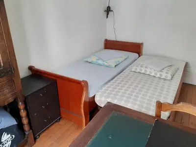 Un ou plusieurs lits dans un hébergement de l'établissement Appartement Petroff