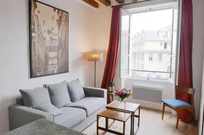 Coin salon dans l'établissement Apartments Cosy