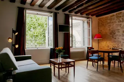 Coin salon dans l'établissement Apartments Cosy